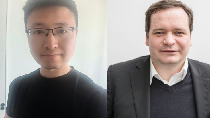 Zwei Männer, ein Asiate und ein Europäer