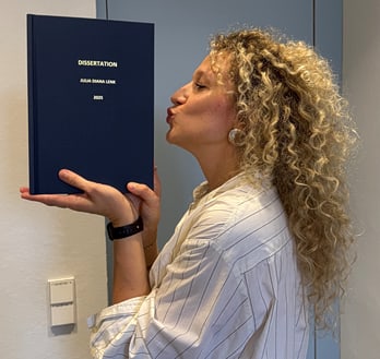 Julia Diana Lenk with dissertation